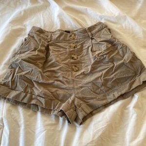 Olive drab green shorts. With pockets.